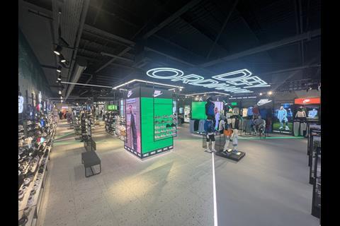 Interior of Footasylum store, Lakeside Shopping Centre, showing childrenswear and footwear on display